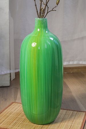 Что можно поставить в напольную вазу кроме цветов
